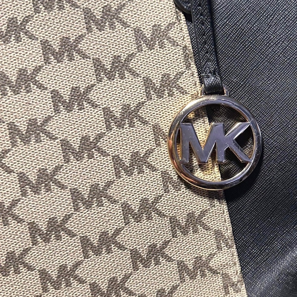 Large Michael Kors Monogram Shoulder Bag. Never used. 15 in x 13 in
